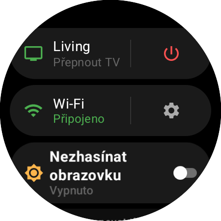 Nabídka hodinek s aktivním Roku a zkratkou Přepnout TV vedle červeného tlačítka napájení