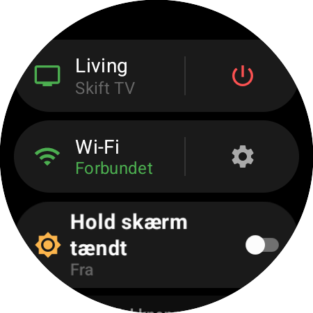 Urmenu med den aktive Roku og genvejen »Skift TV« ved siden af en rød tænd/sluk-knap