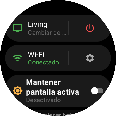 Menú del reloj con el Roku activo y el acceso Cambiar de TV junto a un botón de encendido rojo