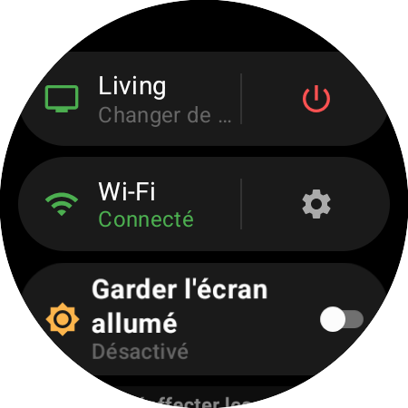 Menu de la montre avec le Roku actif et un raccourci Changer de TV à côté d’un bouton marche/arrêt rouge