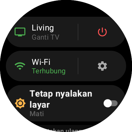 Menu jam tangan dengan Roku aktif dan pintasan “Ganti TV” di samping tombol daya merah
