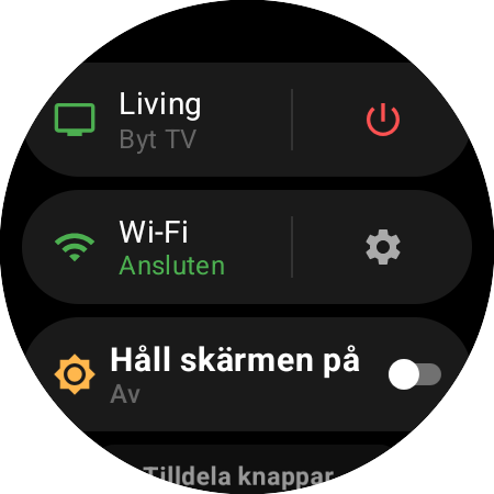 Klockans meny med den aktiva Roku-enheten och genvägen Byt TV bredvid en röd på/av-knapp