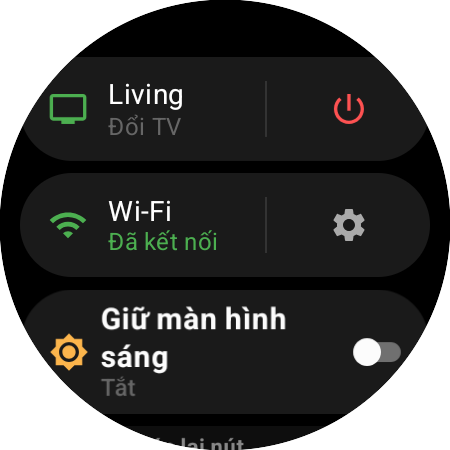 Menu đồng hồ với Roku đang dùng và lối tắt “Đổi TV” cạnh nút nguồn màu đỏ